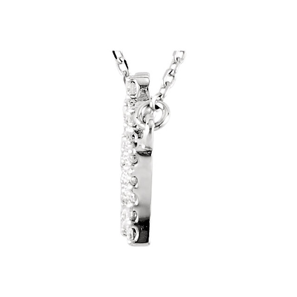 Simple 14k white gold diamond petite crown necklace. Diamonds are an accent in this necklace design, they total 1/5 ct. tw. The pendant is suspended from a 16.45-inch solid cable chain that fastens with spring ring clasp.