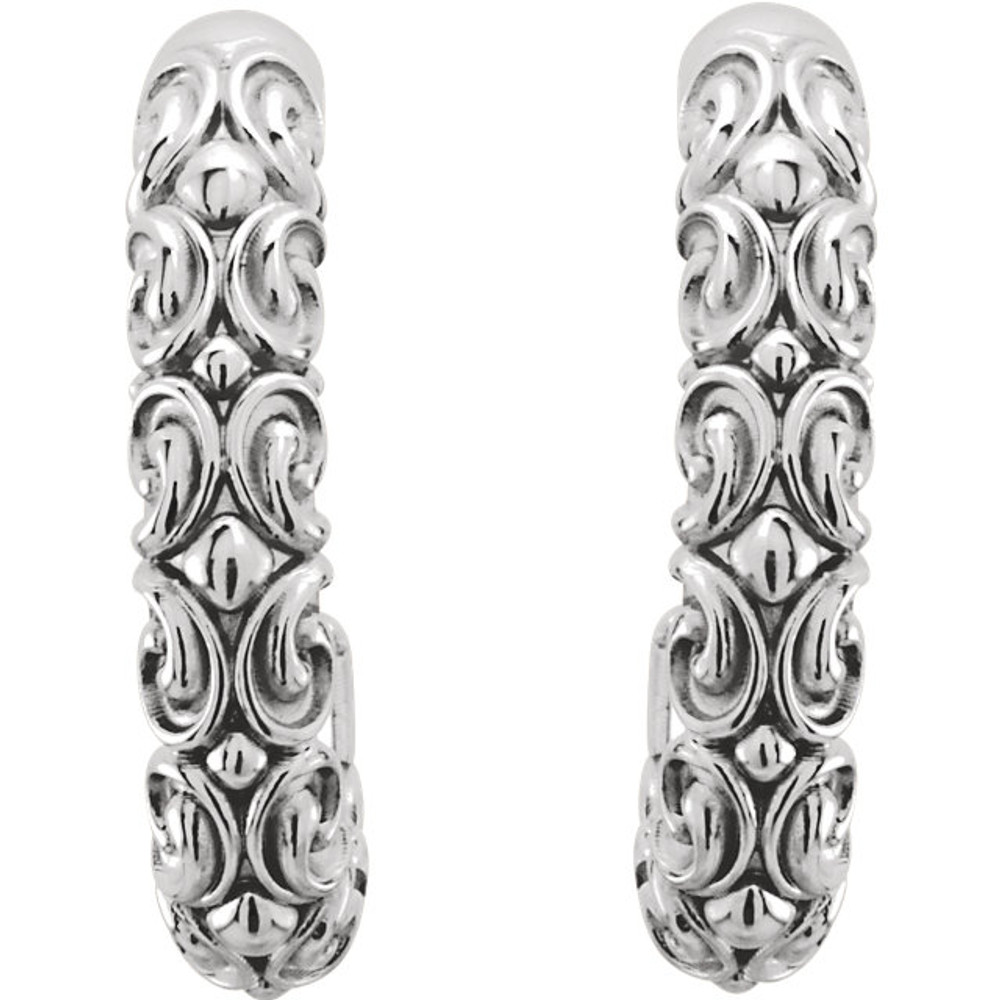 A glittering update to the classic hoop, these 20.00 x 04.10mm earrings will draw the eye as well as compliments. Fashioned in precious 14K gold, these sparkle half hoop earrings are polished to a bright finish and secure with friction backs.