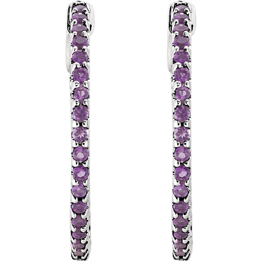 Designed with the February-born birthday girl in mind, these glam and glistening hoops are perfect for her vivacious personality. Fashioned in 14K White Gold, these hoops feature an array of shimmering bright purple amethyst set along the inside and outside edges. Brilliant from every angle, these polished hoops secure comfortably with hinged backs.