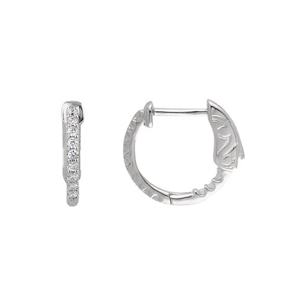 A brilliant choice for all day wear, these 14K white gold hoop earrings are embellished with a beautiful row of dazzling diamonds totaling 1/4 ct. Designed to transition beautifully from day into night, these polished hoops secure comfortably with hinged backs. 