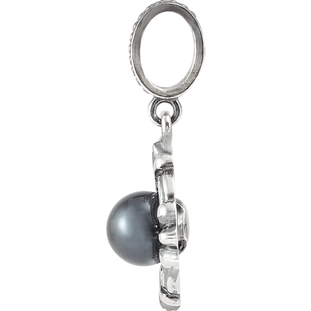 An elegant look, this drop pendant will catch the eye and captivate. Fashioned in fine sterling silver, this dazzling pendant has luminous 6.0mm cultured round half drilled akoya pearl.