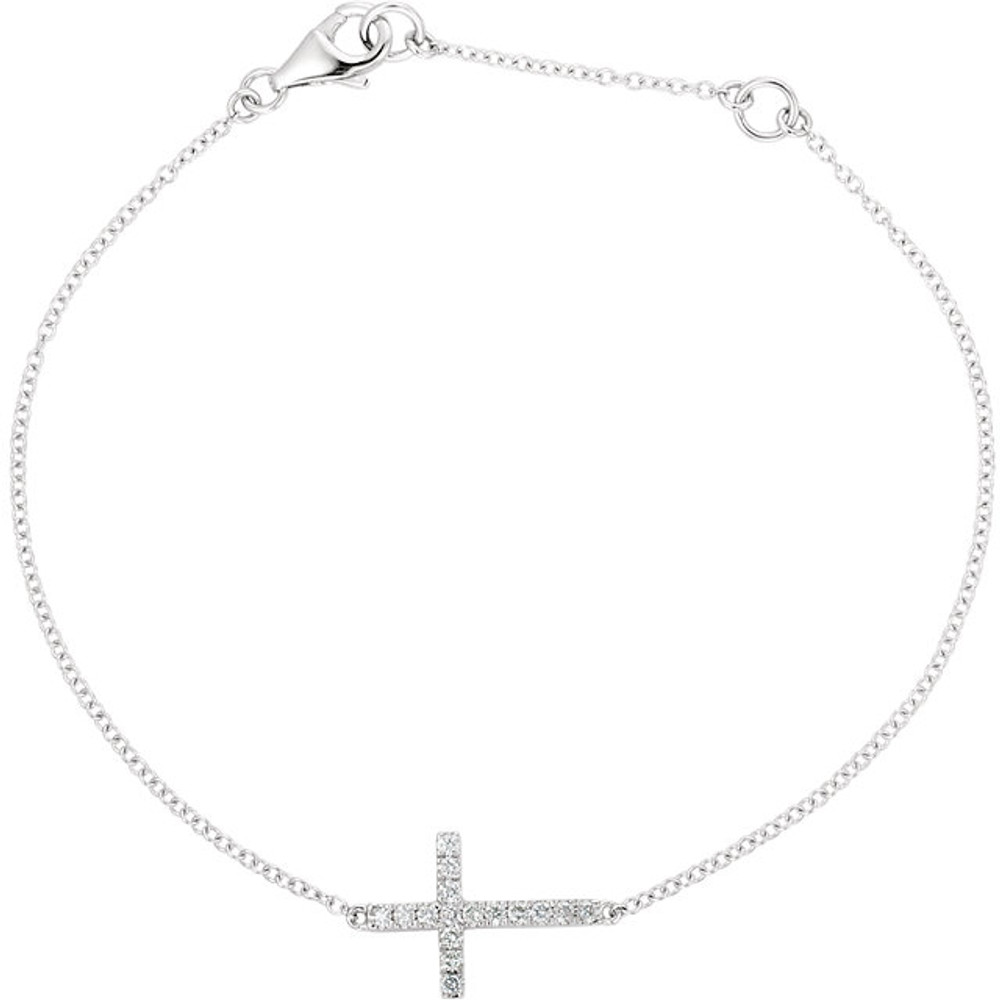 Simple and stylish, this bracelet is as much about faith as it is fashion. Crafted in 14K white gold, this Diamond Sideways Cross features a traditional cross lined with glistening diamonds in 1/5 ct. tw. and turned on its side.