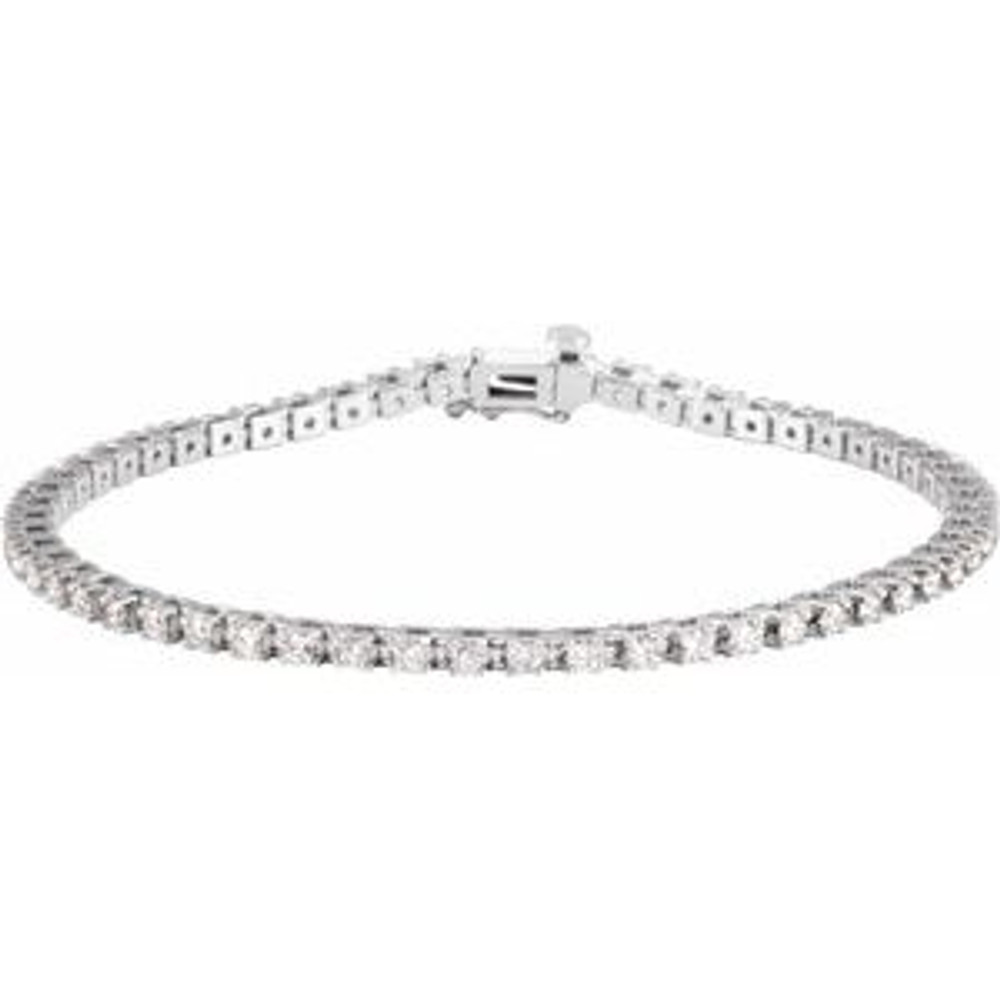 Sparkling, lab grown diamonds are set in a classic 14k white gold, four-prong 7.25" tennis bracelet.