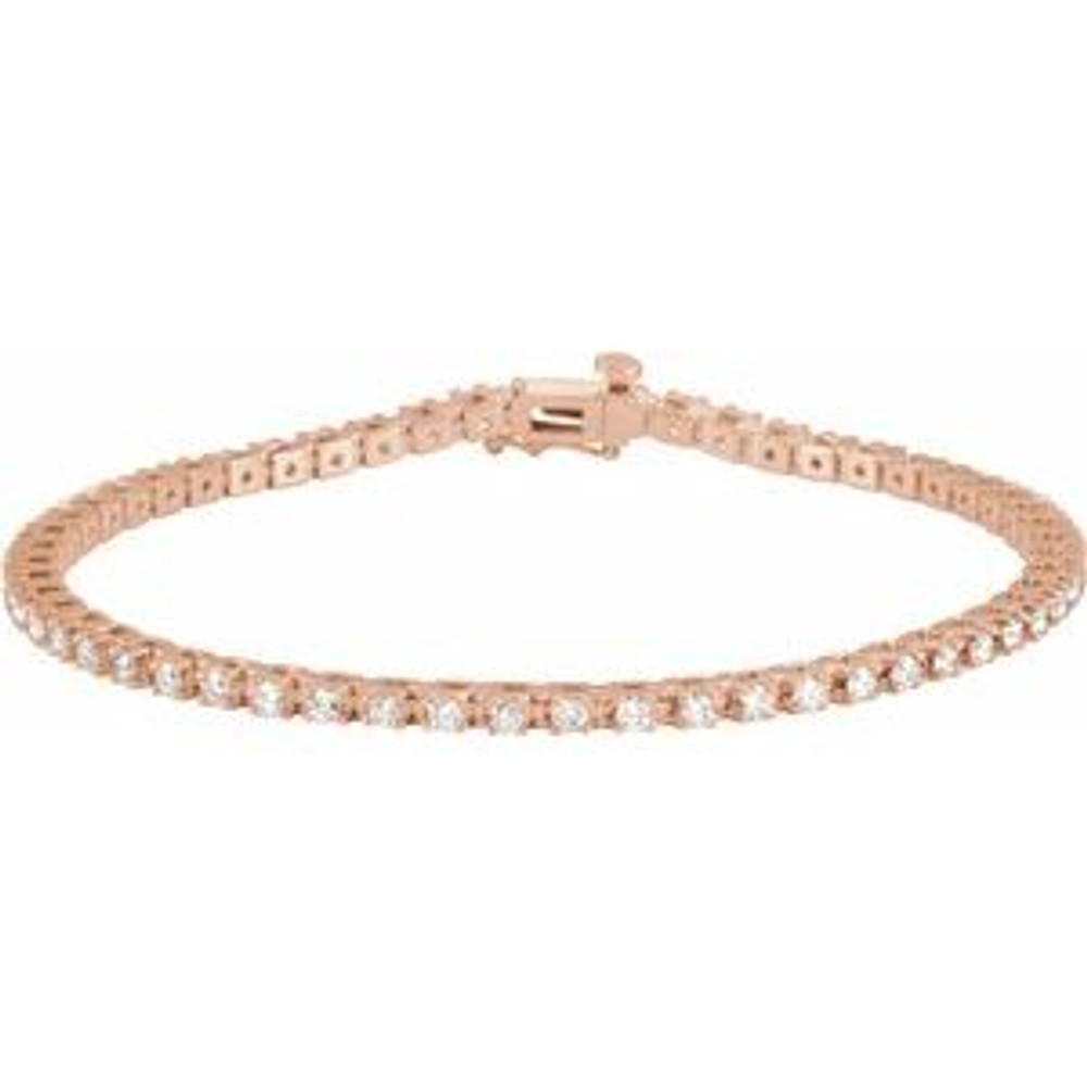 Sparkling, lab grown diamonds are set in a classic 14k rose gold, four-prong 7.25" tennis bracelet.