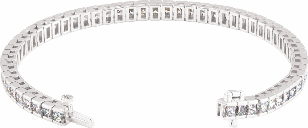 This fabulous 9 1/3 ct. t.w. diamond tennis bracelet is a breathtaking piece that we really love. Sparkling and sensational, it's a classic that features a stream of princess cut diamonds so gorgeous that it will have heads turning for a second look. 18kt white gold bracelet. 