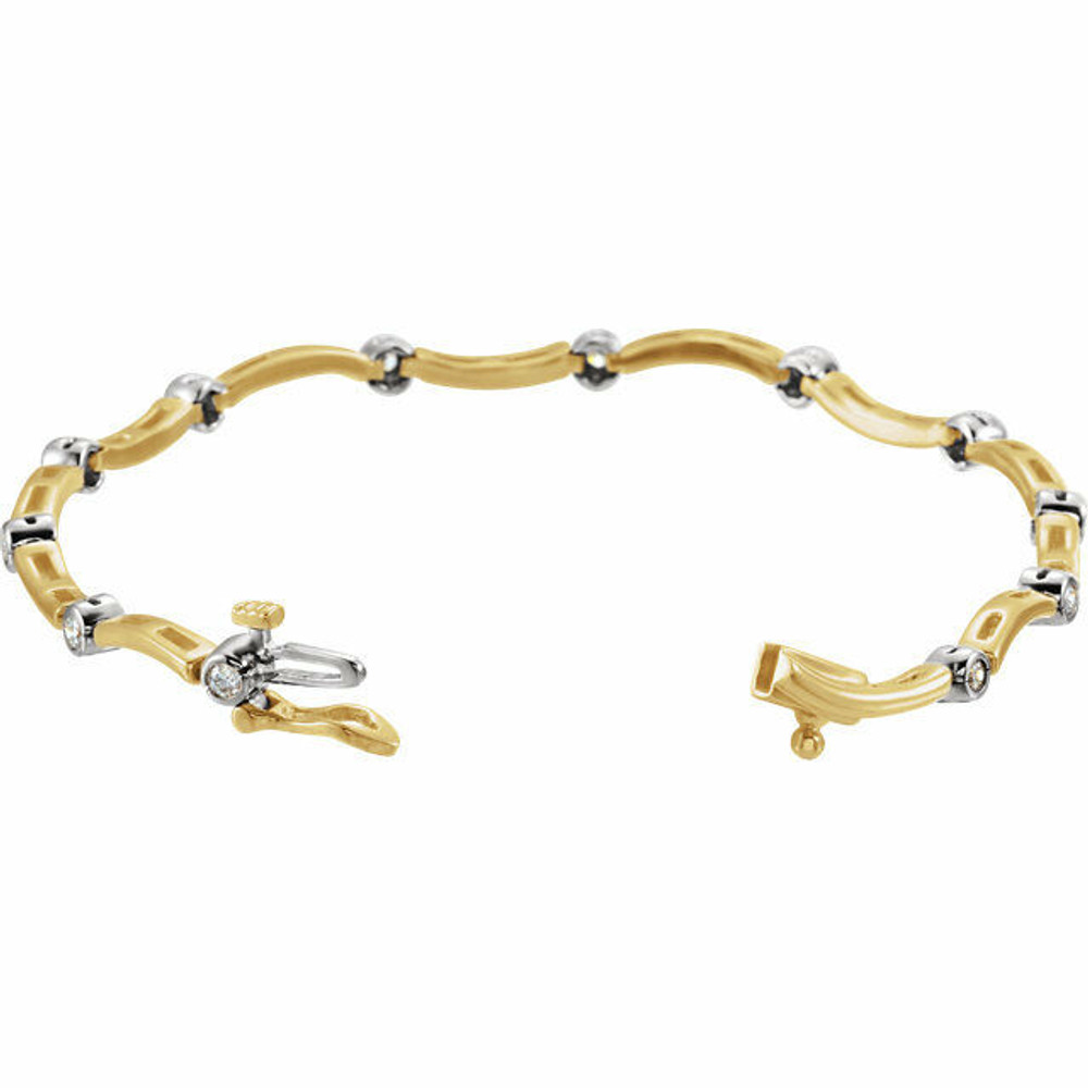 This gorgeous bracelet, hand set with 12 brilliant diamonds and 14k yellow gold, is sure to turn heads with its delicate design and classic appeal.