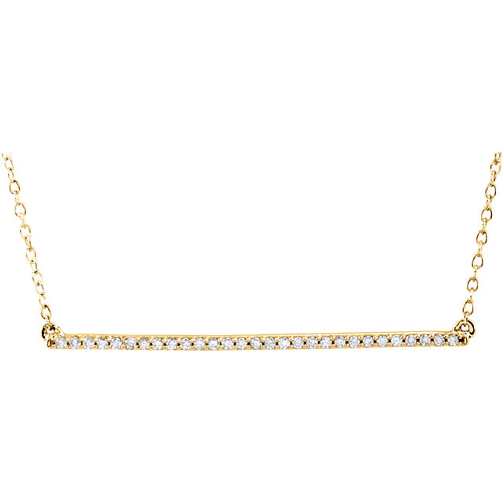 A straight bar is the focal point in this petite necklace for her. Suspended between cable chains, the 14K gold 18 inch necklace in length and fastens with a lobster clasp.