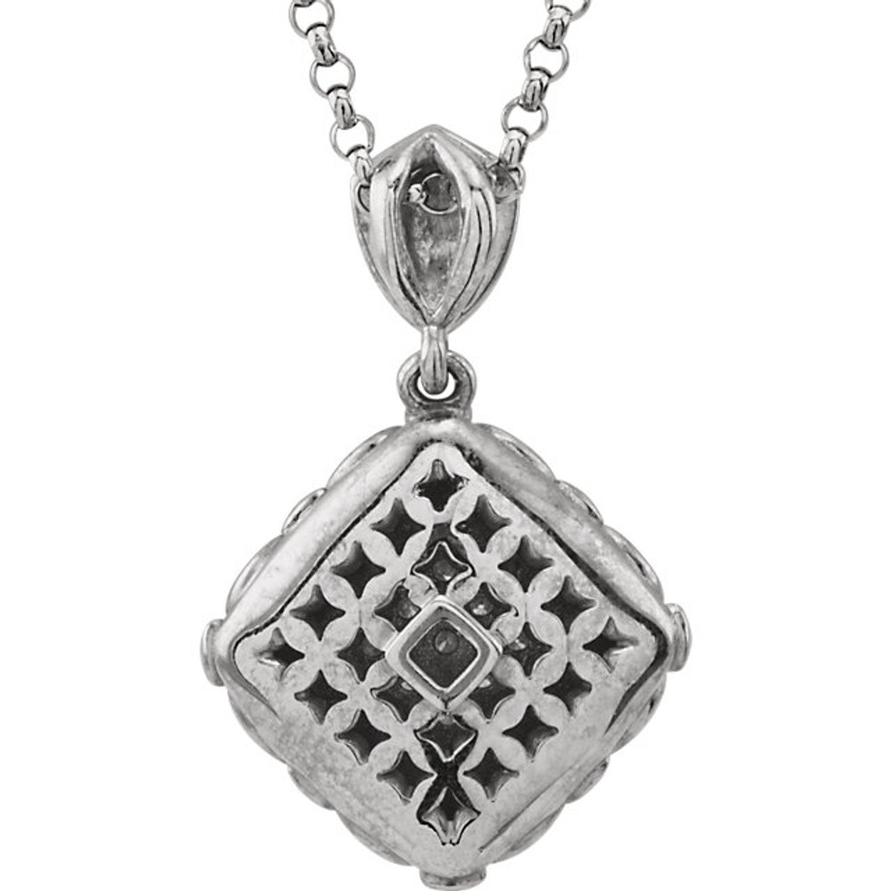 This stunning 14k white gold pendant features nine round diamonds in the center. Diamonds are 1/8ctw, G-H in color, and I1 in clarity. Pendant is 24.60mm in length, 15.90mm in width, and is displayed on an 18inch white gold rolo chain.