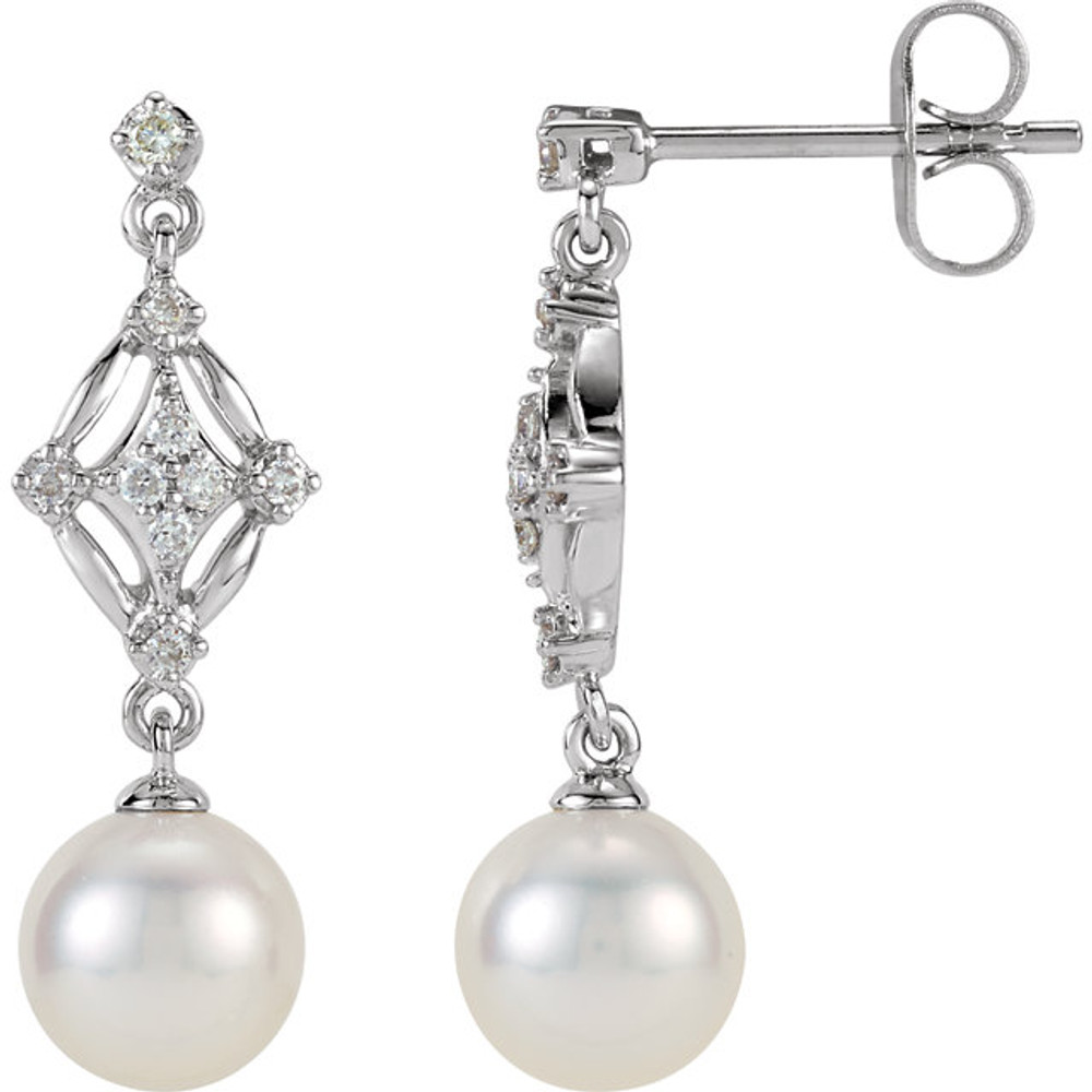 These elegant 14k white gold earrings each feature a 7mm freshwater cultured pearl with diamond accents. Diamonds are 1/6ctw, H-I in color, and I1 or better in clarity.