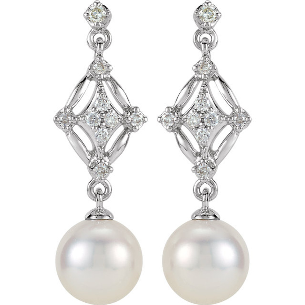 These elegant 14k white gold earrings each feature a 7mm freshwater cultured pearl with diamond accents. Diamonds are 1/6ctw, H-I in color, and I1 or better in clarity. 