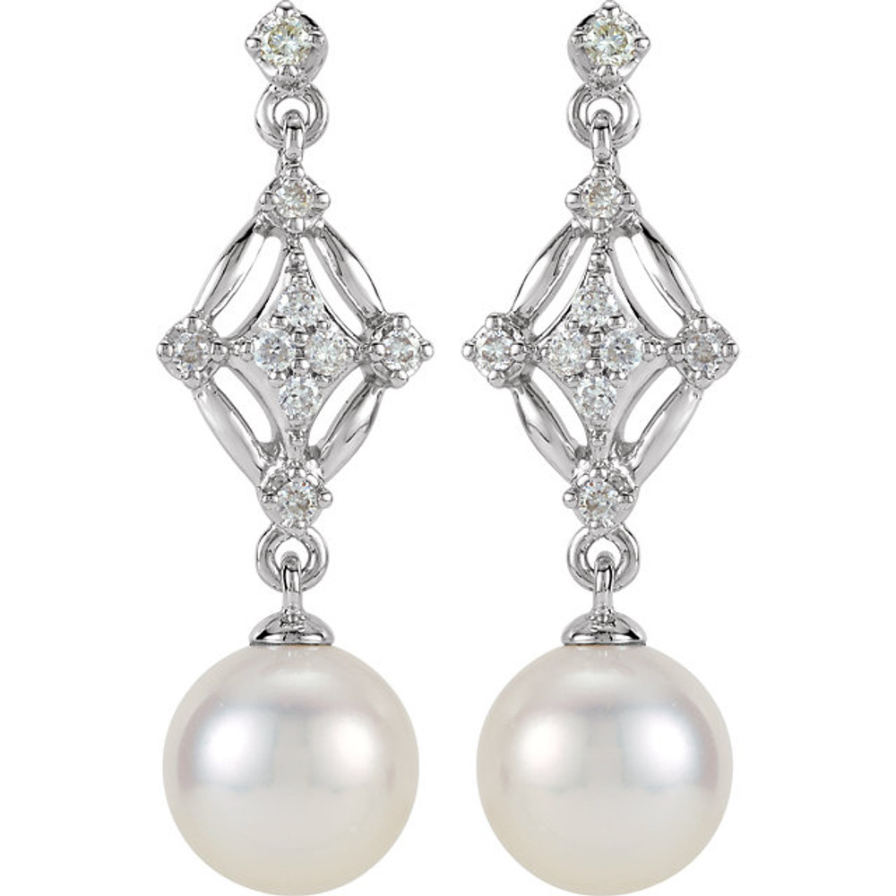 These elegant 14k white gold earrings each feature a 7mm freshwater cultured pearl with diamond accents. Diamonds are 1/6ctw, H-I in color, and I1 or better in clarity.