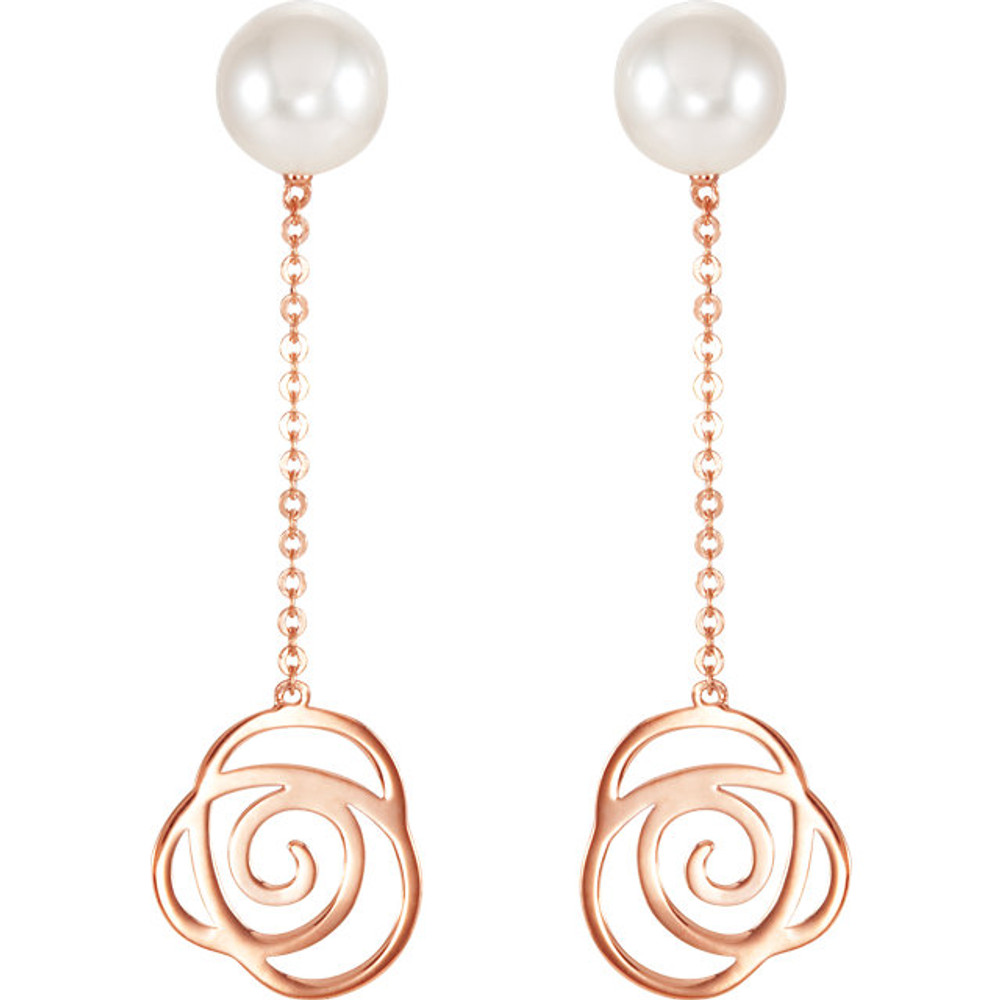 These earrings feature 6.5mm freshwater cultured pearl set in 14k rose gold. Polished to a brilliant shine.