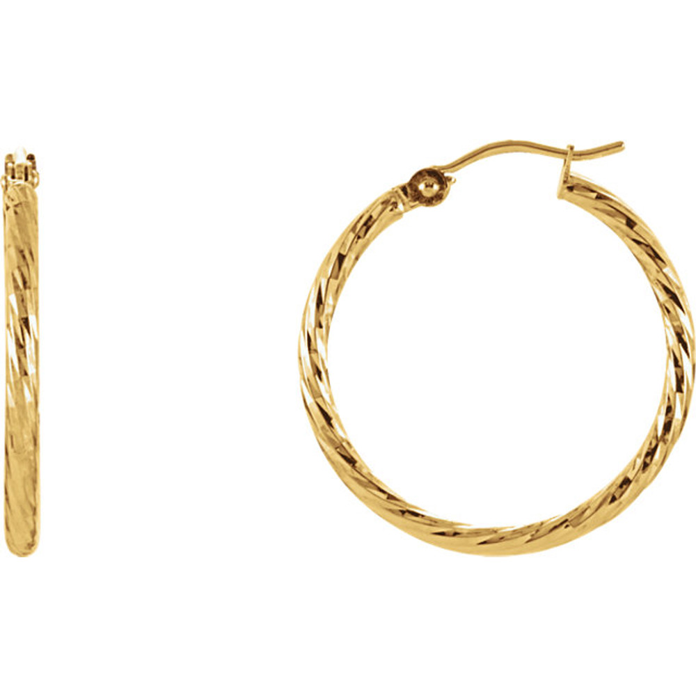 We all know that the style possibilities are endless with hoops, so these gorgeous yellow gold hoop earrings will take you from the staff meeting to the ski lodge in supreme style! They are a knock-out, any season of the year. Snap-bar, 14kt yellow gold earrings with diamond-cut finish.