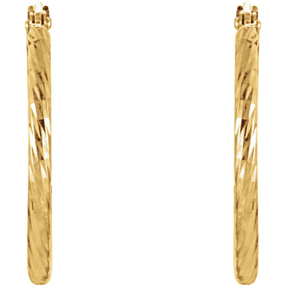 We all know that the style possibilities are endless with hoops, so these gorgeous yellow gold hoop earrings will take you from the staff meeting to the ski lodge in supreme style! They are a knock-out, any season of the year. Snap-bar, 14kt yellow gold earrings with diamond-cut finish.