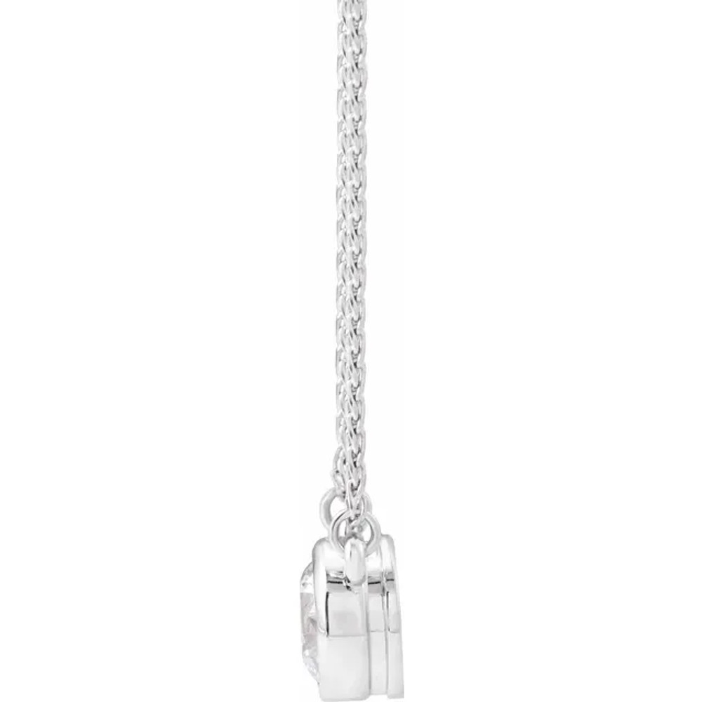 Add a touch of elegance to your jewelry collection with this stunning 6.5mm round cubic zirconia necklace. The bezel-set solitaire pendant hangs on an 18-inch chain, creating a timeless piece that can be worn for any occasion.