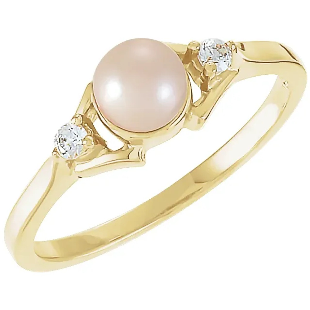 This elegant pearl and diamond ring classes up any ensemble. Seated at the pinnacle of this 14k yellow gold ring is a 5mm white freshwater cultured pearl, which is adorned by two small diamonds. Diamonds are .06ctw, G or better in Color, and I1 or better in Color.