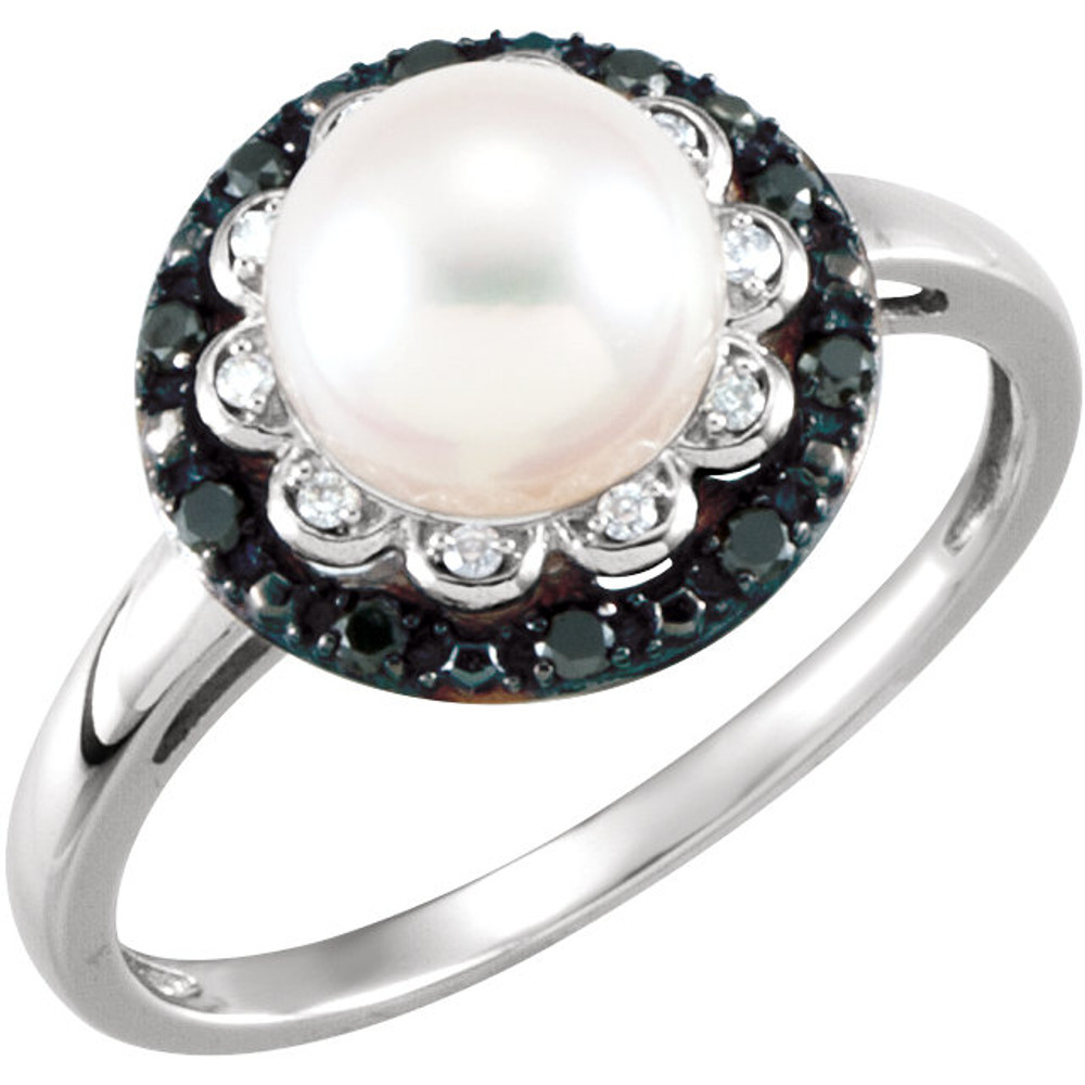 A lovely freshwater cultured pearl is encircled with round diamonds in this classic 14k white gold ring for her. The total diamond weight is 1/6 carat.