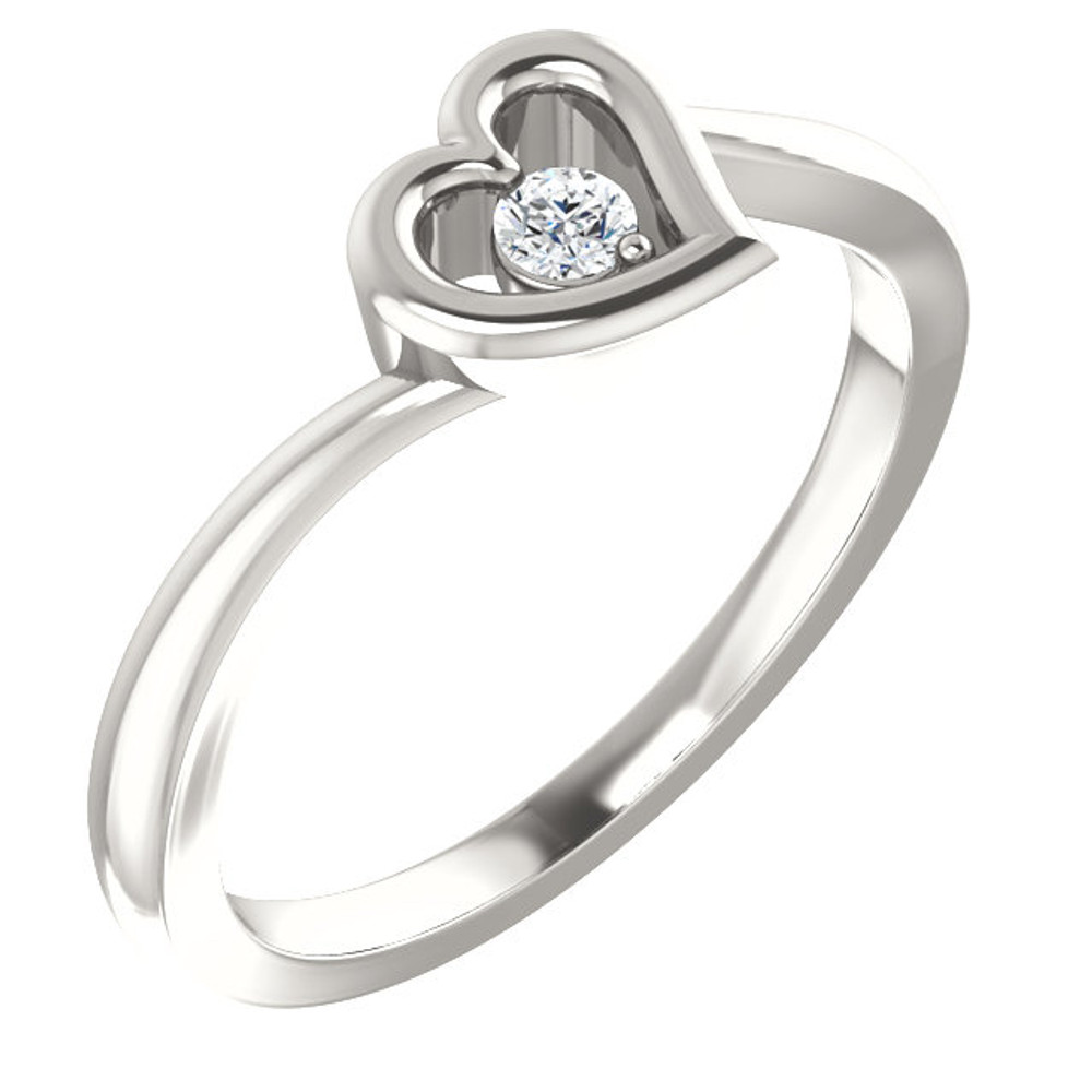 Cubic Zirconia Heart Ring In Sterling Silver. Polished to a brilliant shine.