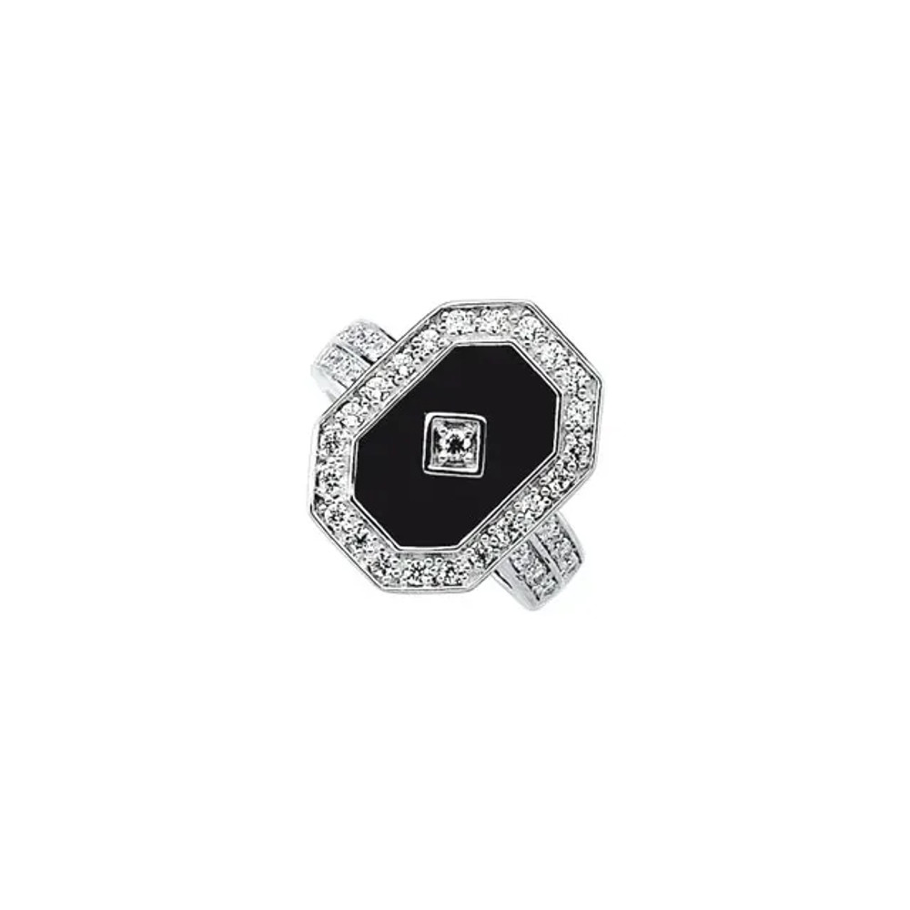 A dramatic onyx is caressed by cibic zirconia atop this edgy ring for her.