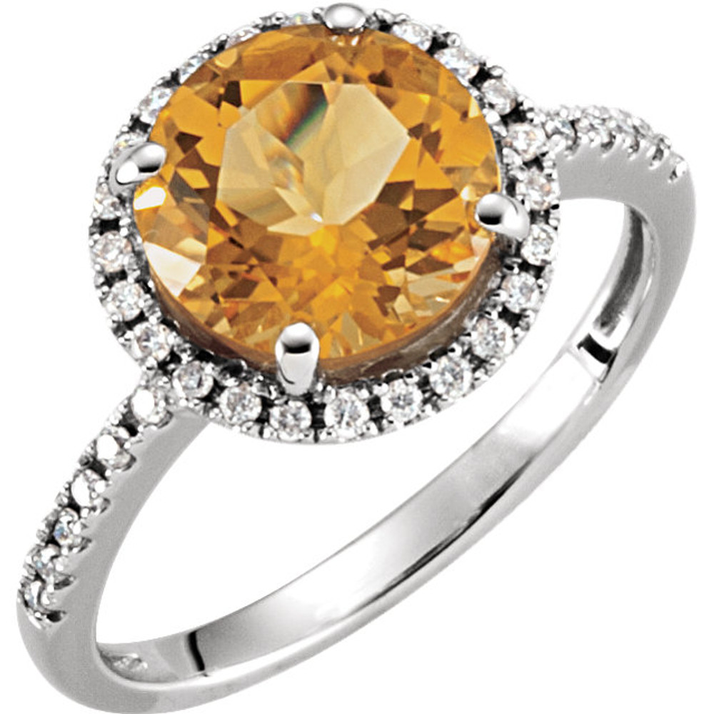 Refined and timeless, this citrine gemstone and 1/6ctw diamond ring fashionably stands out, complemented by 14k white gold.