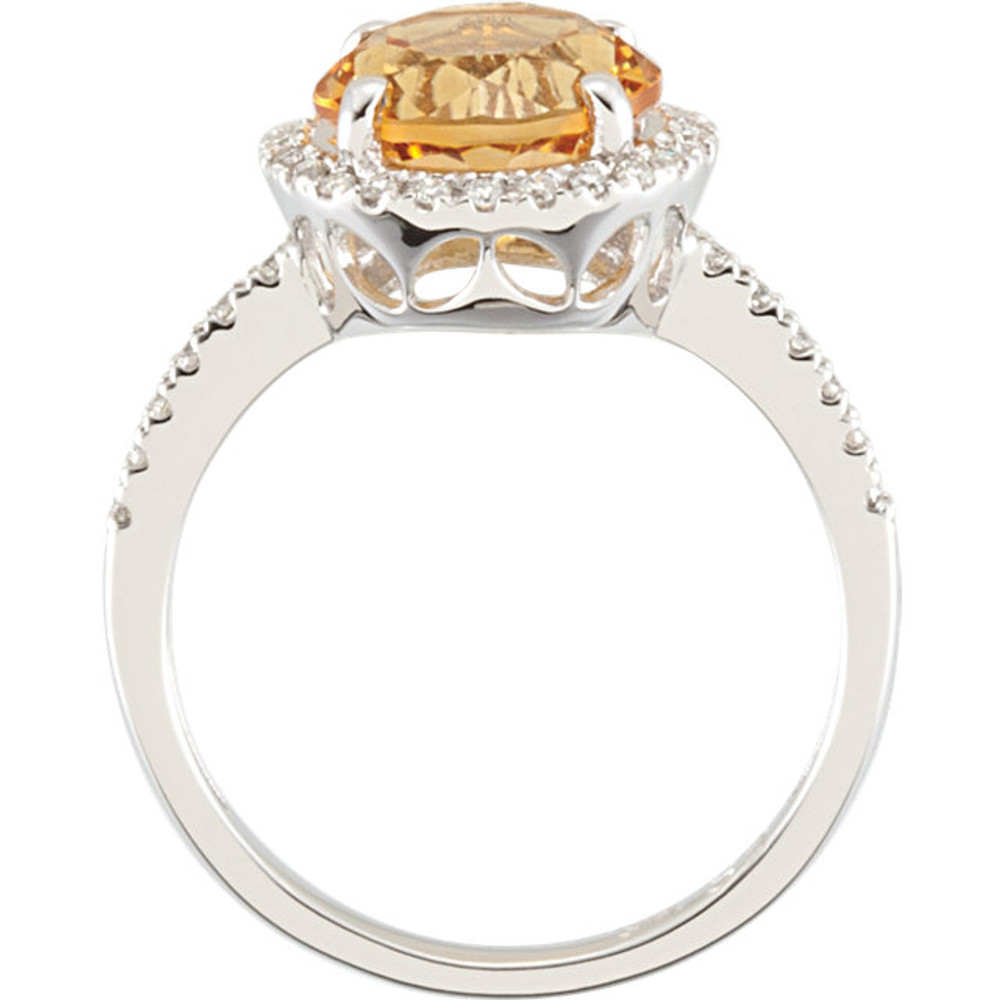 Refined and timeless, this citrine gemstone and 1/6ctw diamond ring fashionably stands out, complemented by 14k white gold.