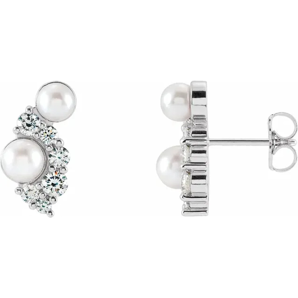 These beautiful pearl earrings feature four lustrous AA+ quality 4.0-4.5mm white Akoya pearls. The pearls are mounted on sterling silver with dazzling I1 clarity diamonds.