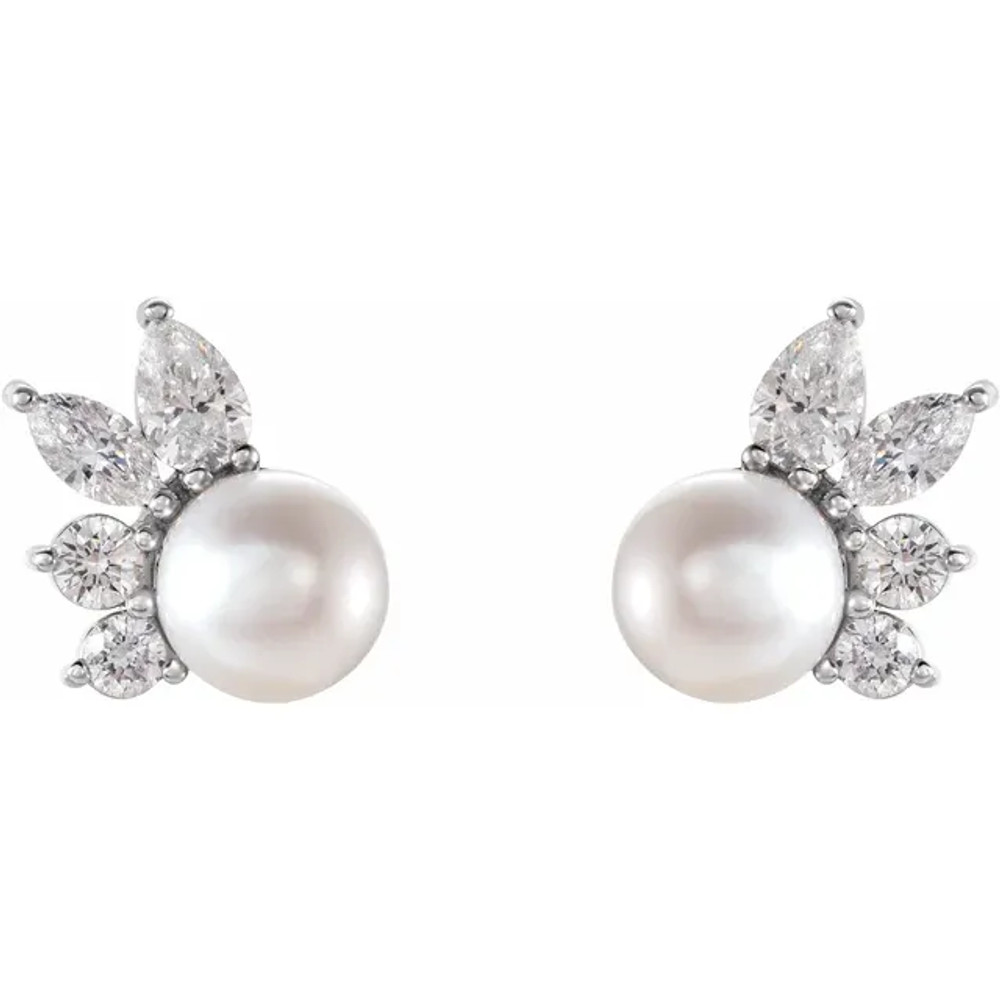 These beautiful pearls earrings add a touch of class to any occasion. The earrings feature two AA+ quality, 5.50mm Akoya cultured pearls, hand picked for their gorgeous luster and surface. The pearls are mounted with 1/2 carats of I1 and SI2-SI3 diamonds on 1.86 grams of the finest 14K gold. 