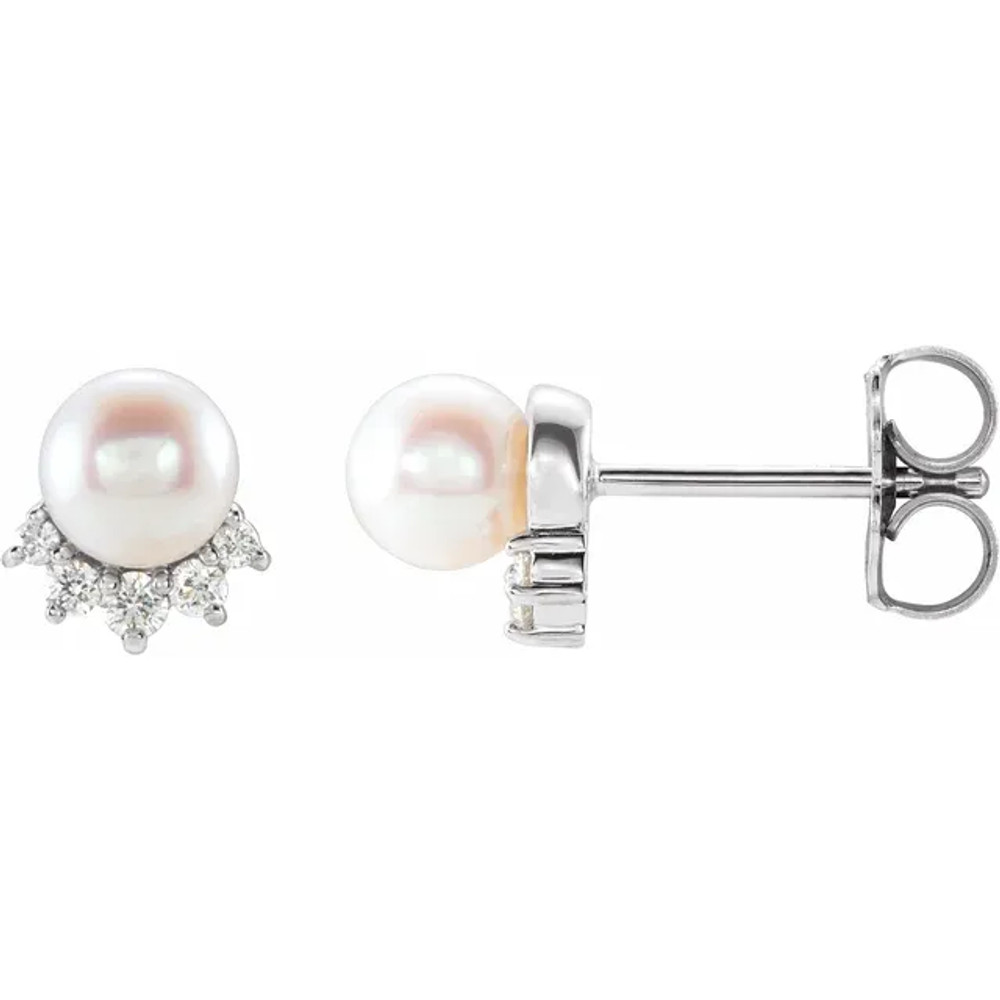 Specifications
Weight: 	1.41 grams
Length: 	6.29 mm
Material: 	Gold
Width: 	6.26 mm
Height: 	2.02 mm
Plating Type: 	Rhodium-Plated
Surface Finish: 	Polished
Primary Stone Shape: 	Pearl
Diamond CTW: 	0.08
Jewelry Material Type1: 	Gold
Metal Purity1: 	14k
Metal Color1: 	White
Die Struck: 	N
Metal Mold: 	N
Post Diameter: 	.03 In
Earring Type: 	STUD
Earring Post Type: 	Friction
Earring Back Type Included: 	Friction Backs Included
Earring Closure: 	Friction Post and Back
Post Length: 	.37 In
Center Stone Size Range: 	4.5-5 mm
Diamond Color: 	G-H
Diamond Clarity: 	I1
Primary Stone Count: 	2-stone
Primary Stone Type: 	Pearl
Selling Unit of Measure: 	PR

Comes Set With
Quantity 	Stone
2 	01.50 MM (01.41 - 01.55) Full Cut, I1 ROUND G-H GENUINE DIAMOND
2 	04.50-05.00 MM AA Half Drilled, Cultured Pearl - Near Round Half Drilled Freshwater; AA Quality; WHITE
4 	01.00 MM (00.95 - 01.15) Full Cut, I1 ROUND G-H GENUINE DIAMOND
4 	01.30 MM (01.25 - 01.35) Faceted, I1 ROUND G-H GENUINE BOM DIAMOND