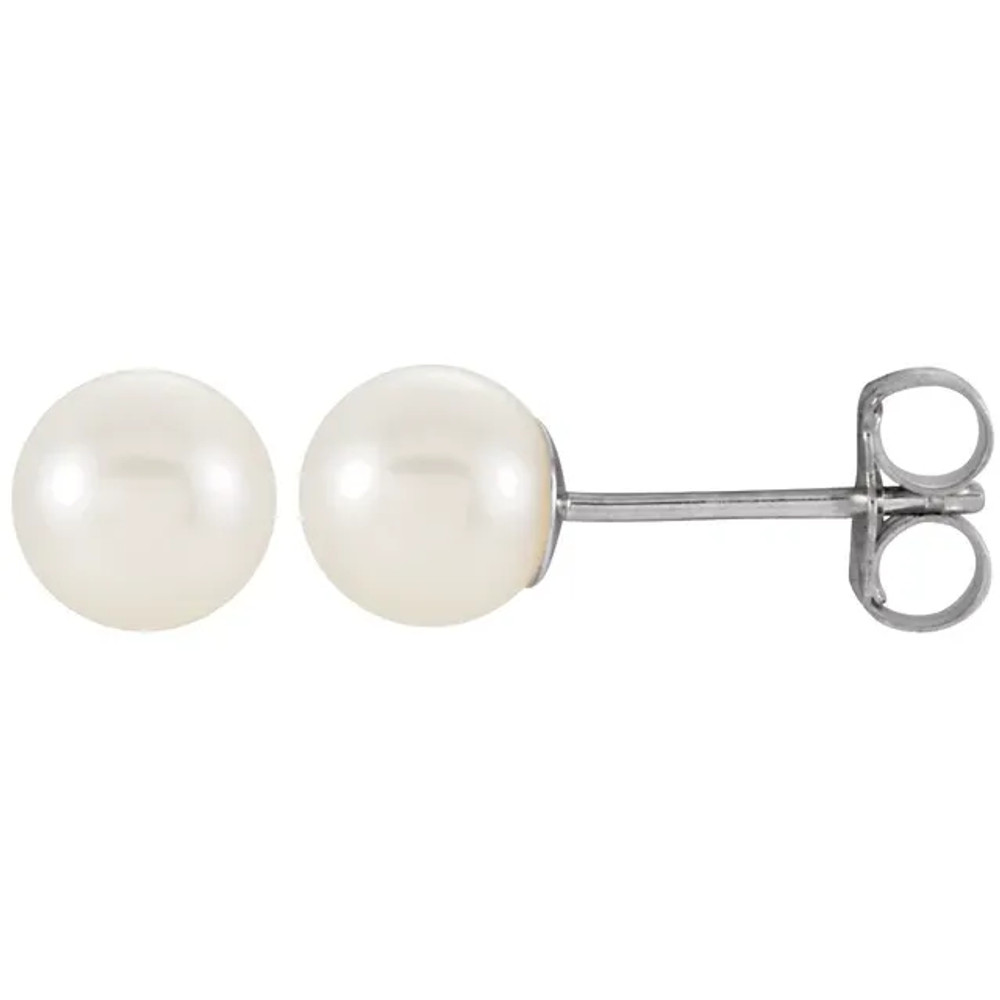 Simple yet striking, these pearl stud earrings are a fabulous any time look.