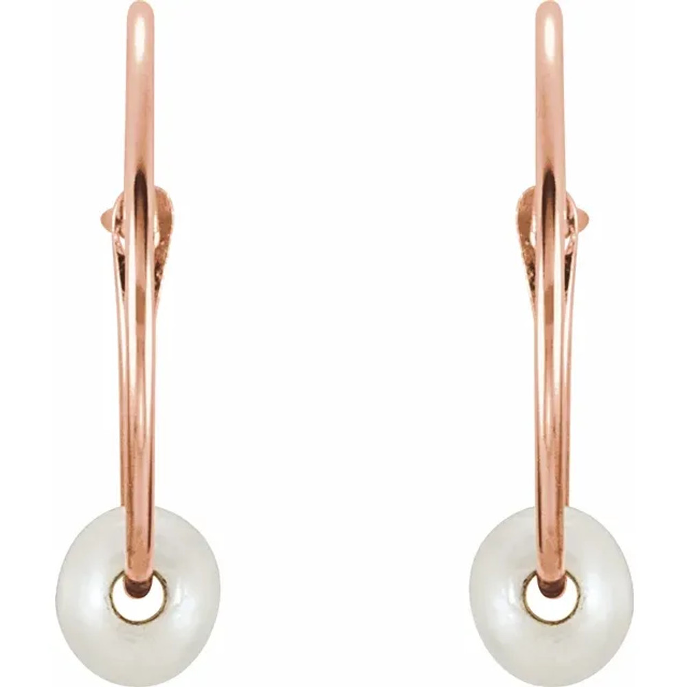 Meant to be hers, these pearl hoop earrings complement her upbeat personality.