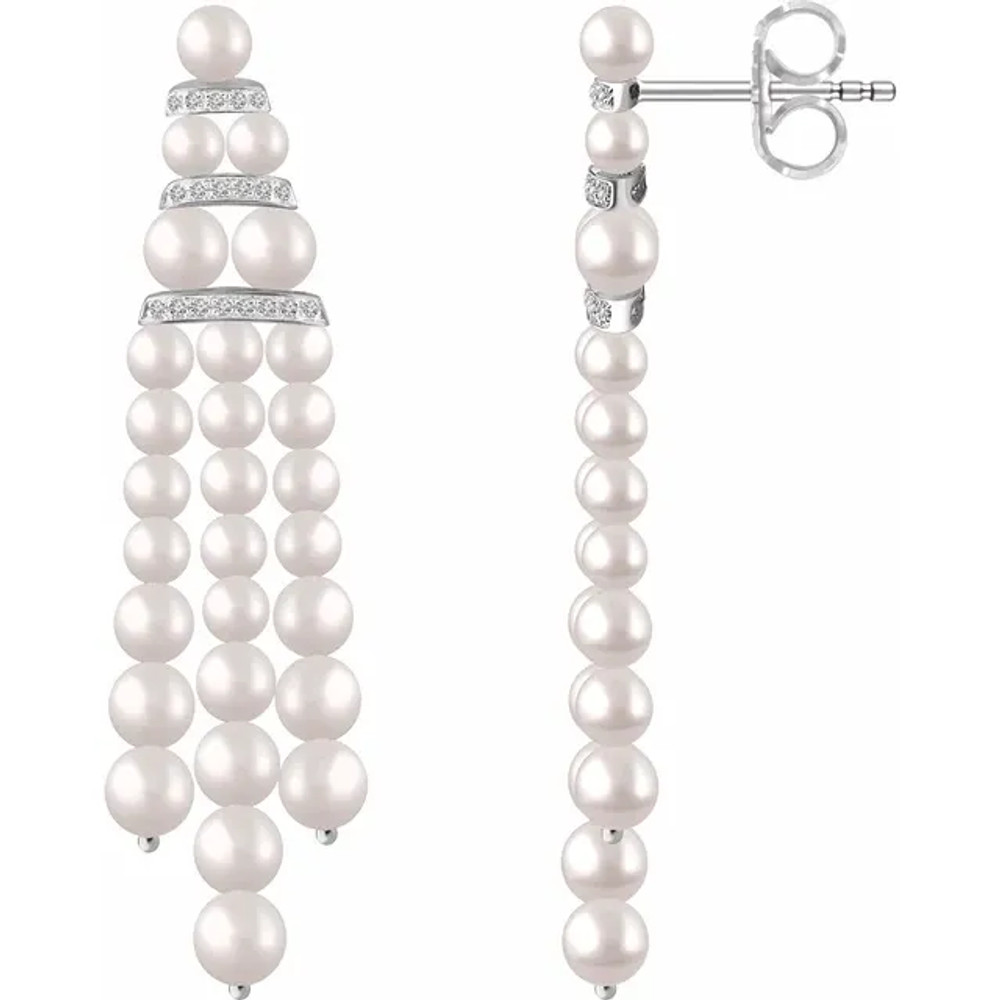 Feminine and fashion-forward, these pearl and diamond chandelier earrings take your look to the next level.