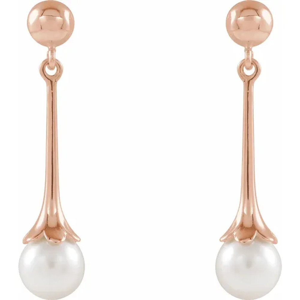 A classic accessory representing her June birthday, these sophisticated pearl drop earrings make any occasion special.