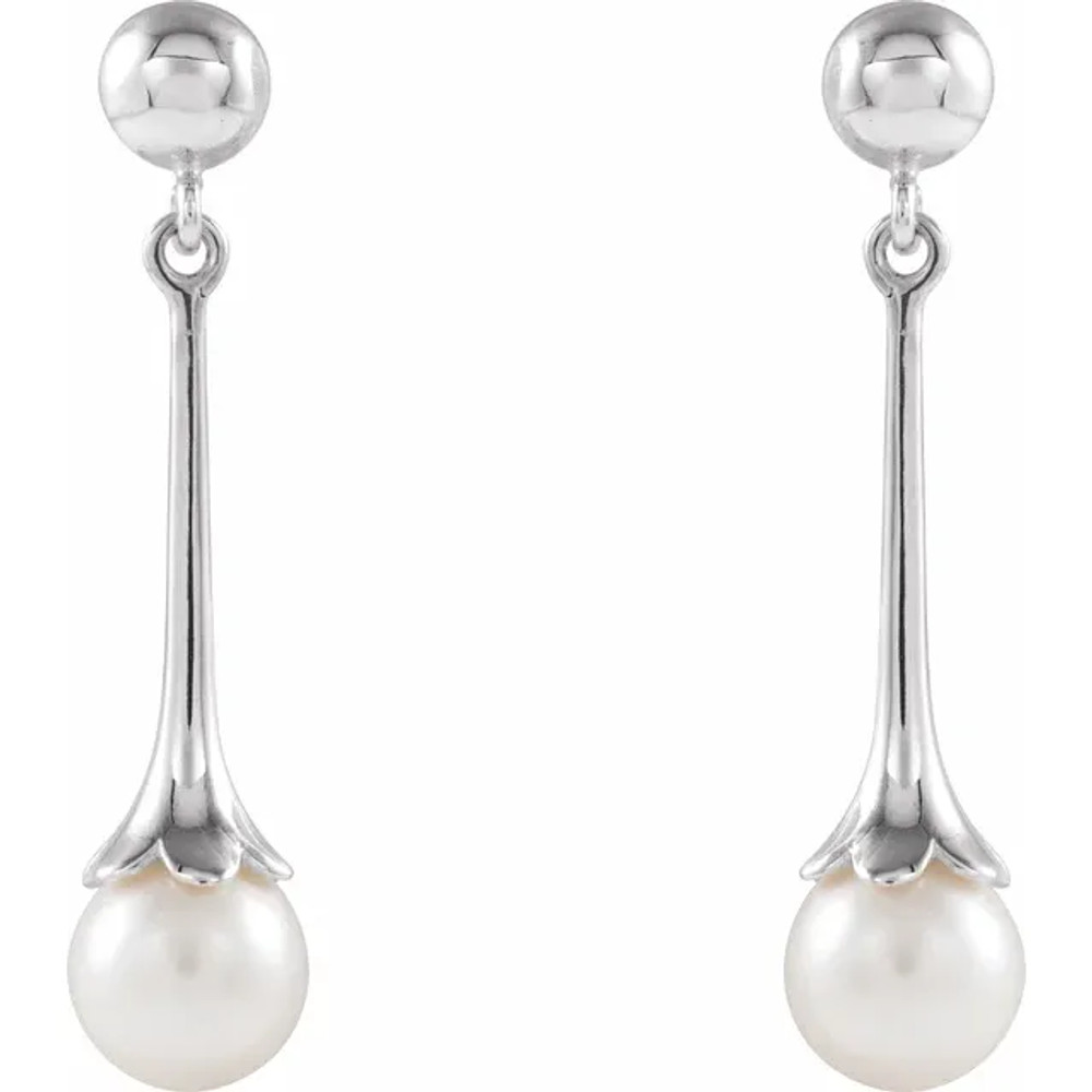 A classic accessory representing her June birthday, these sophisticated pearl drop earrings make any occasion special.