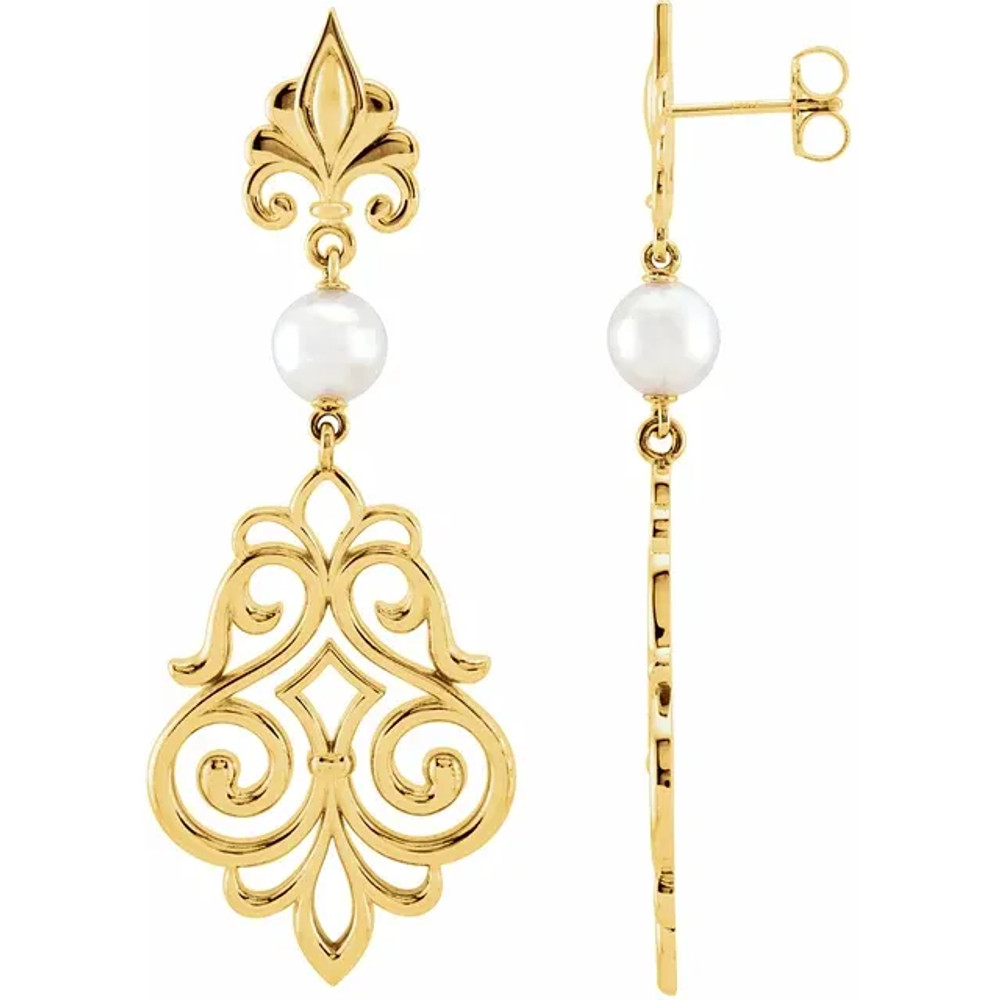 With ease and elegance, these pearl drop earrings complete her tailored anytime attire.