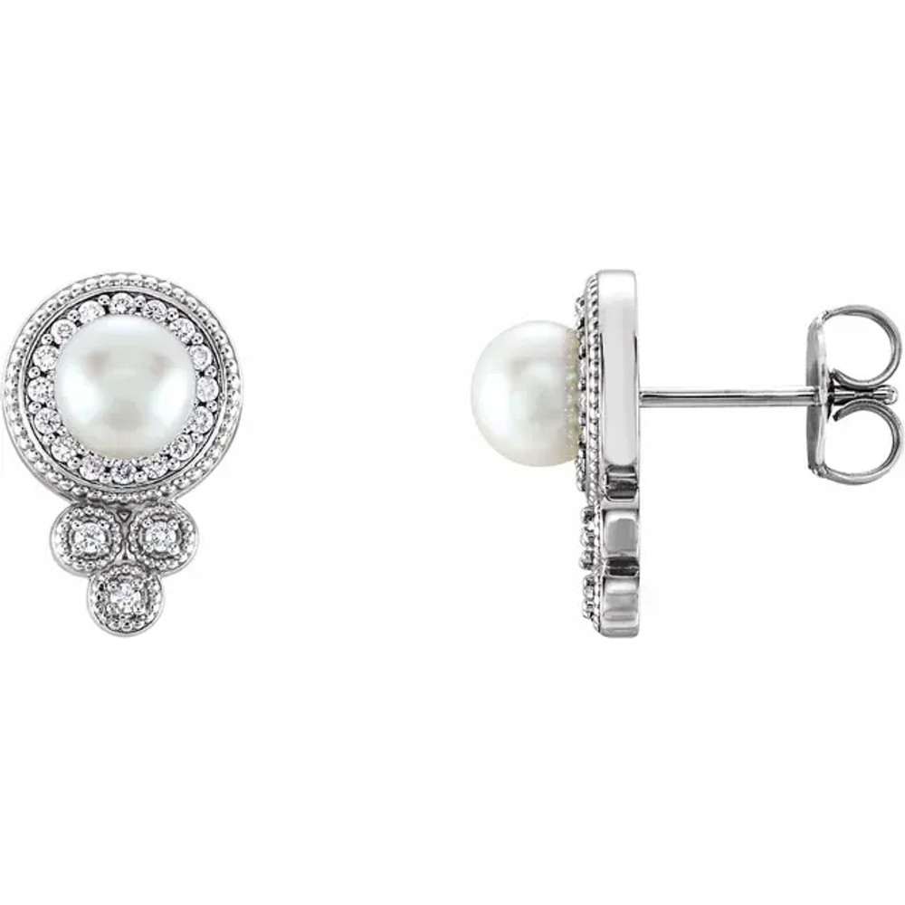These elegant 14k white gold earrings each feature a white freshwater cultured pearl with diamond accents. Diamonds are 1/5ctw, G or better in color, and I1 or better in clarity.