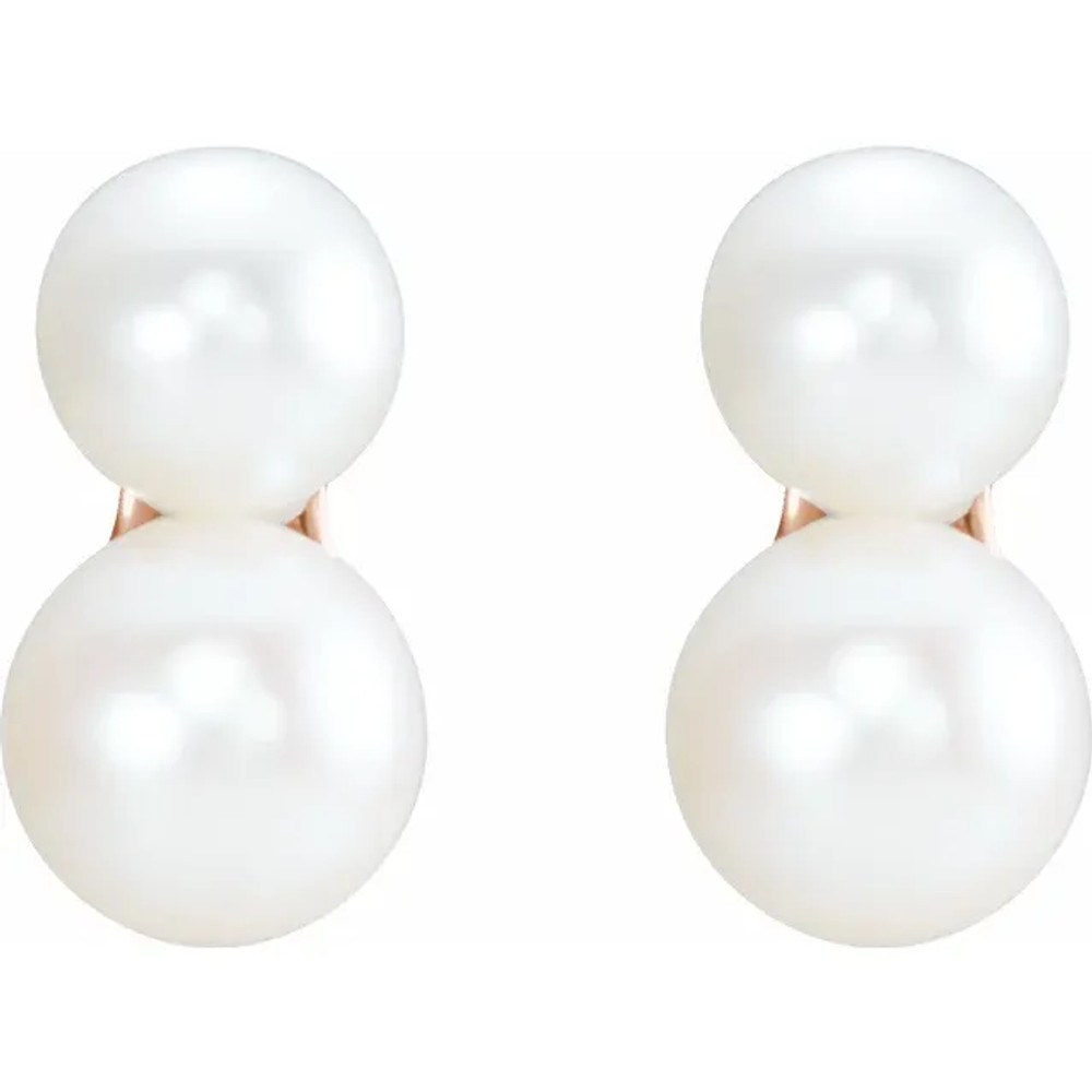 These simple, yet sophisticated freshwater two-stone pearl ear climbers are so easy to wear, for any occasion.