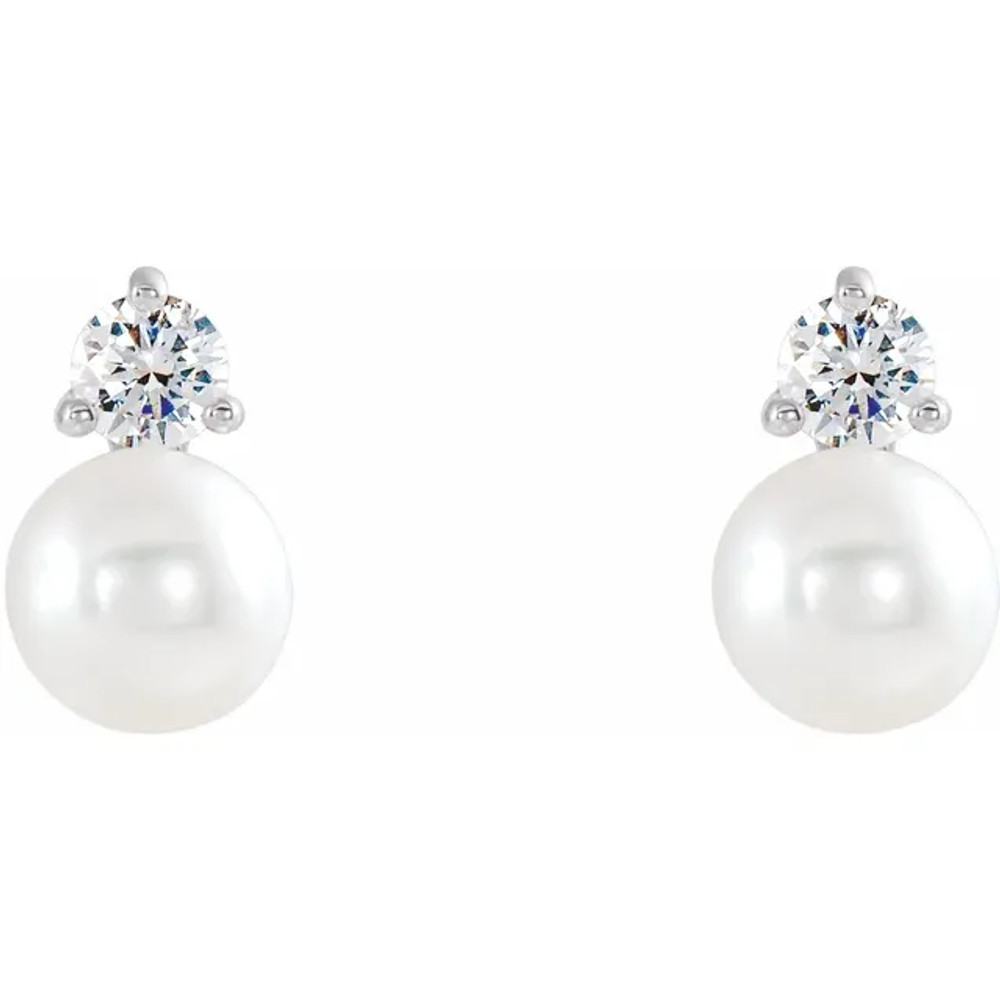 A classic accessory representing her June birthday, these sophisticated pearl stud earrings make any occasion special.