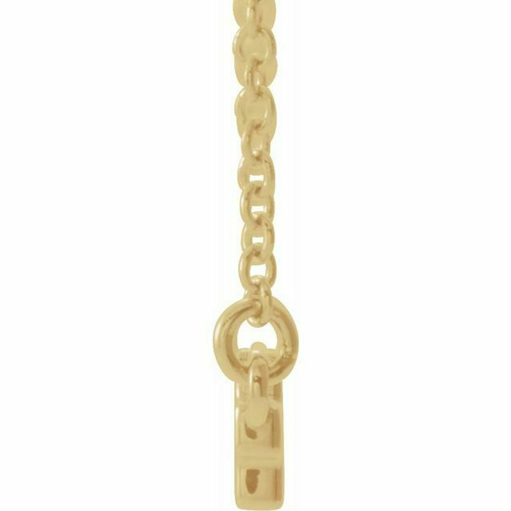 A sideways cross bar 18" necklace is crafted in polished 14k yellow gold to create this lovely symbol of faith. Polished to a brilliant shine. 