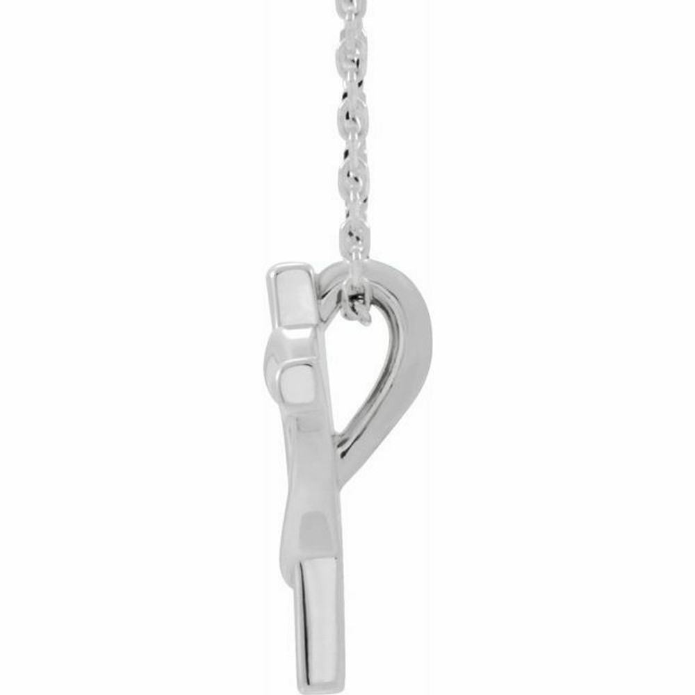 This youth cross with heart 15 inch necklace has an elegant design in 14K white gold. Pendant measures 13.30x9.90 mm and has a bright polish to shine.