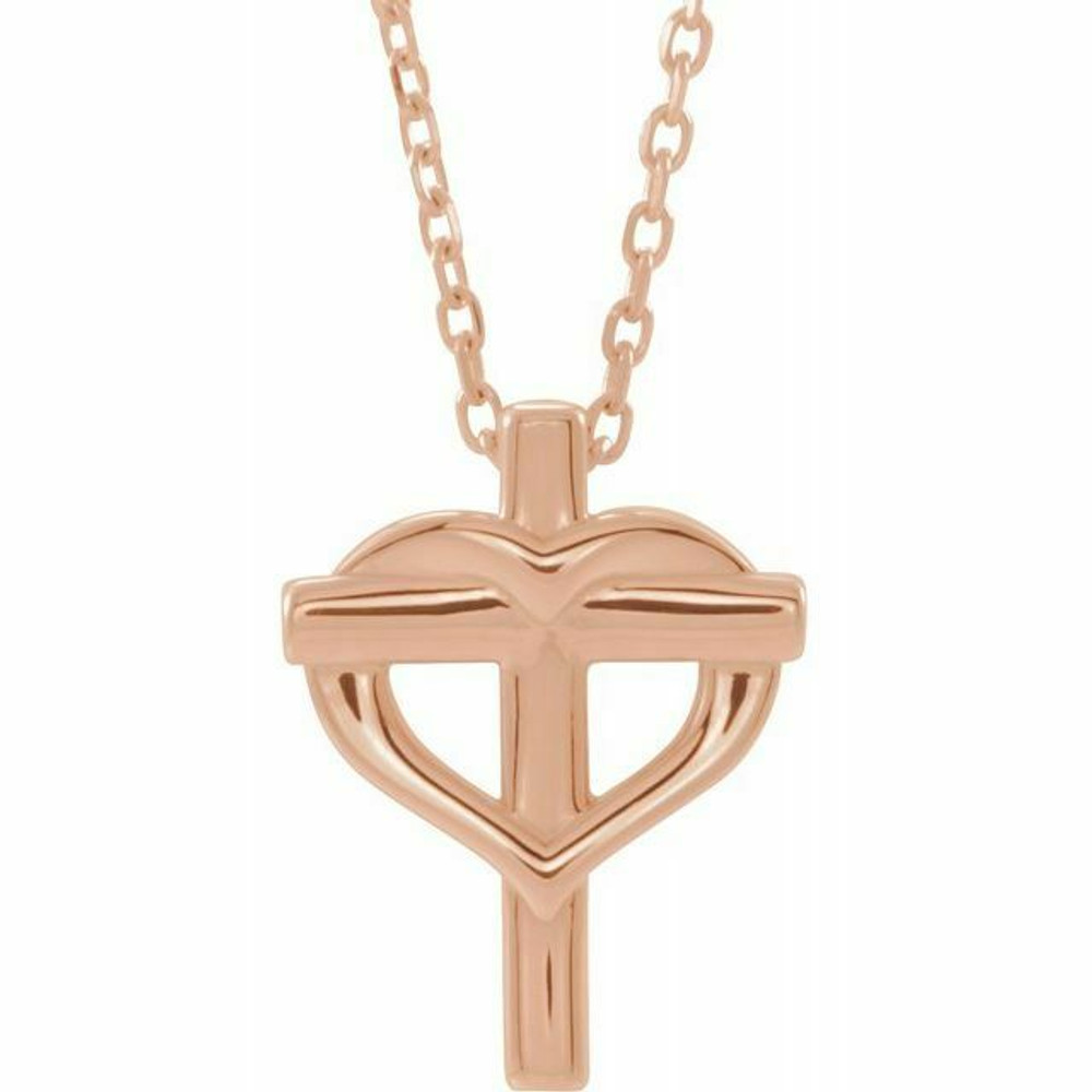 This youth cross with heart 15 inch necklace has an elegant design in 14K rose gold. Pendant measures 13.30x9.90 mm and has a bright polish to shine.