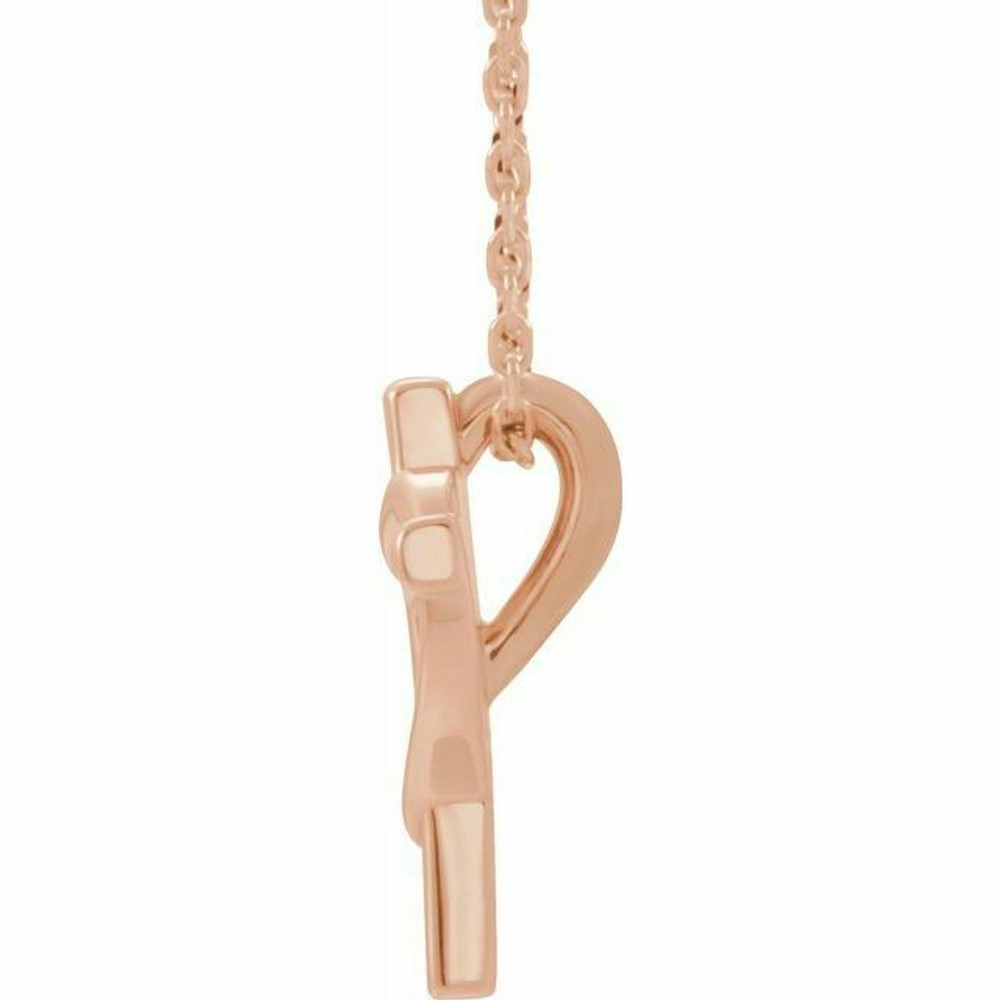 This youth cross with heart 15 inch necklace has an elegant design in 14K rose gold. Pendant measures 13.30x9.90 mm and has a bright polish to shine.