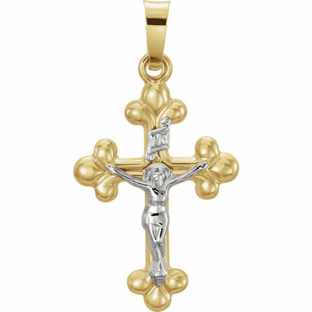 This crucifix pendant is in 14k yellow/white gold and has a bright polished to finish. The crucifix is 27.00mm by 14.00mm and weighs 0.65 grams. Chain sold separately!