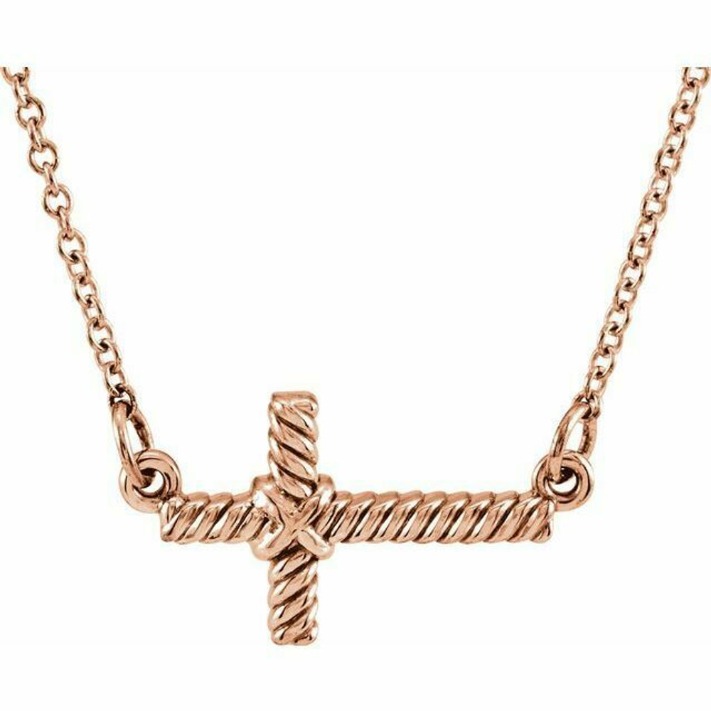 This 14K rose gold sideways rope cross pendant has an elegant yet substantial design. Pendant measures 20.10x11.30mm and has a bright polish to shine.
