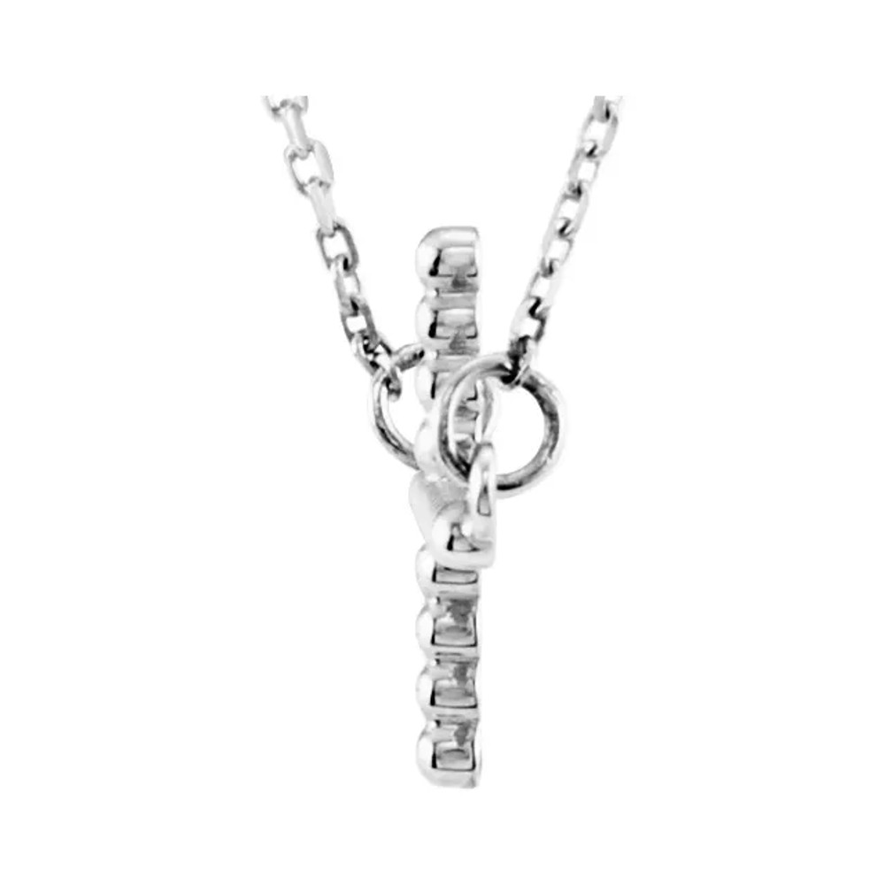 This 14K white gold sideways beaded cross pendant has an elegant yet substantial design. Pendant measures 19.50x12.10mm and has a bright polish to shine.