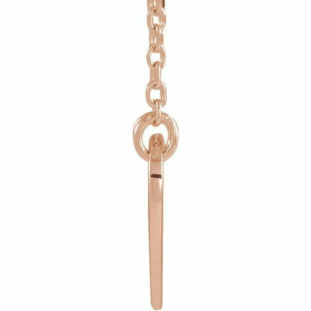 This pierced cross heart 16-18" adjustable necklace has an elegant design in 14K Rose Gold. Polished to a brilliant shine. 