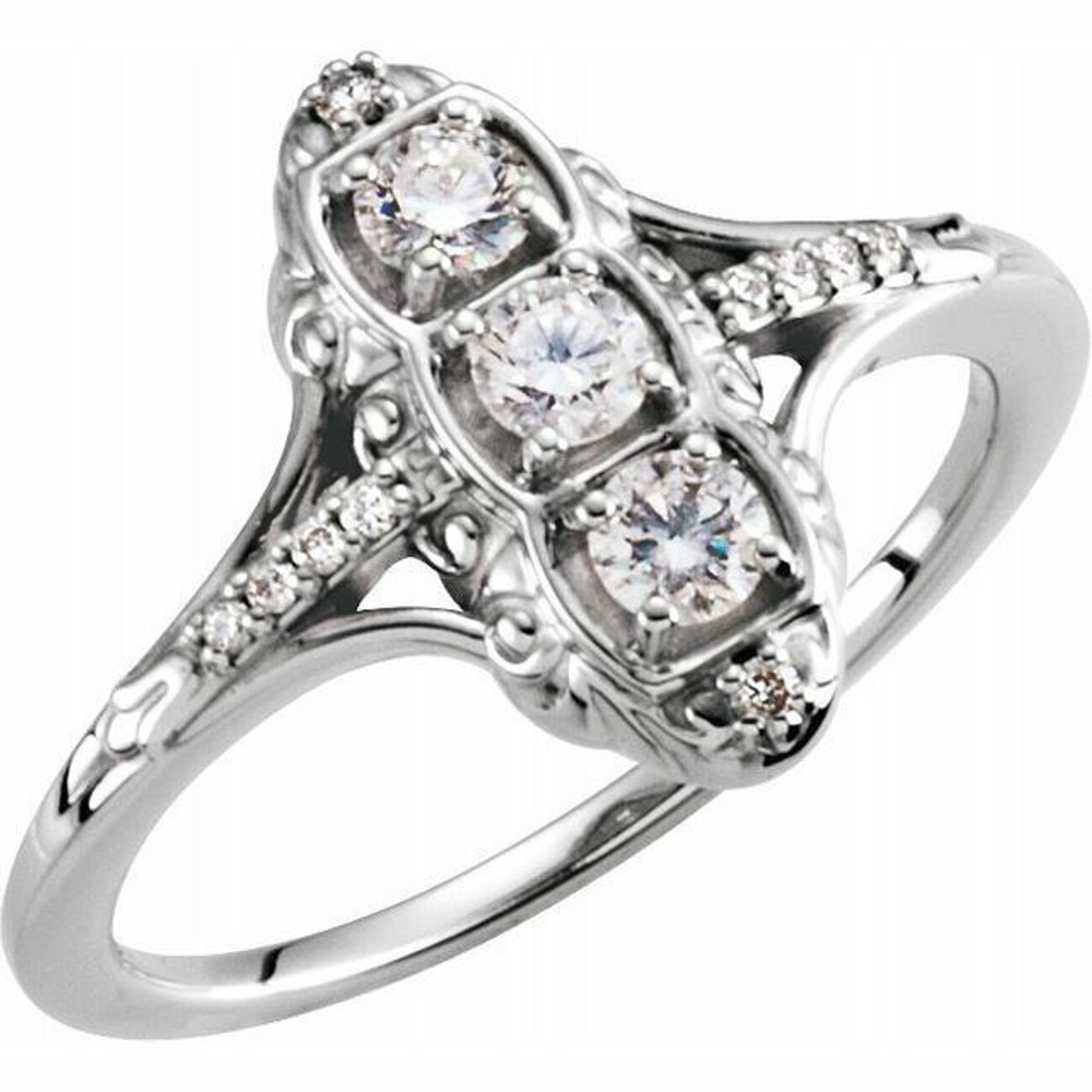 Crafted with a special moment in mind, this elegant diamond three-stone ring is a dazzling choice.