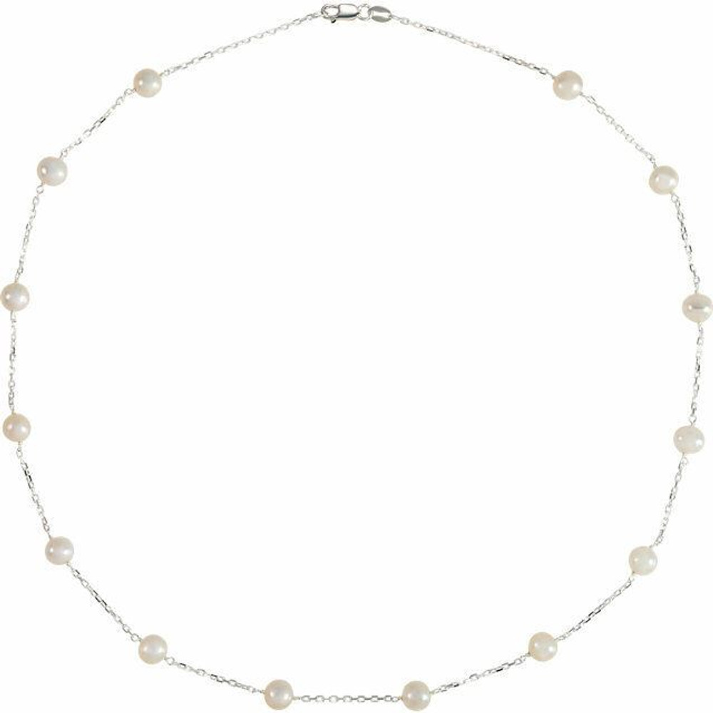 Elevate any attire with this simple yet stunning pearl station 18" necklace. Fashioned in sterling silver, this eye-catching design features 14 luminous 5.5-6.0mm cultured freshwater pearl. Polished to a brilliant shine.