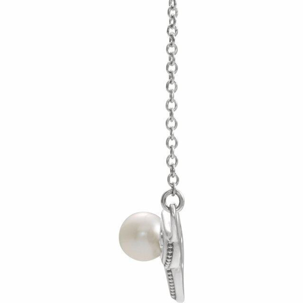 Make a bold and modern fashion statement with this cultured freshwater pearl vintage-inspired bar necklace in Platinum.

Cultured freshwater pearl measure approximately 4.5mm to 5mm in diameter.

This distinctive pendant comes suspended on a Platinum chain in your choice of lengths (16" or 18"), secured with a ring clasp. Just send us a message and let us know if you want a 16 or a 18 inch chain.

The pendant necklace is also available in other metals. 