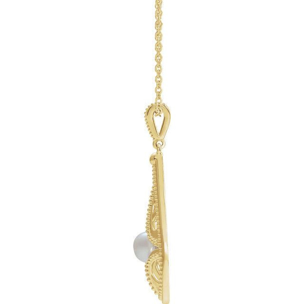 Genuine Freshwater Cultured Pearl Vintage Inspired Design Necklace. They are set in brightly polished Solid 14K Yellow Gold and come on an 16-18" adjustable solid Gold Chain.