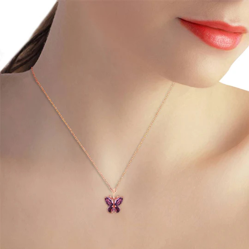 The beauty of butterflies combined with the luscious color of amethyst stones work well together with this 14k rose gold butterfly necklace with purple amethyst. Two marquis shaped natural amethyst stones, along with two round gems add .60 carats of stunning glamor when created in the shape of a feminine butterfly in flight.

Each necklace come with an included 18 inch rope chain that fits the delicate and flirty shape of this necklace. This piece makes a gorgeous addition to any wardrobe, as well as being a wonderfully cute birthstone necklace for February birthday celebrants.